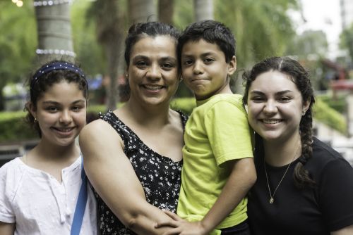 Hispanic woman with her children